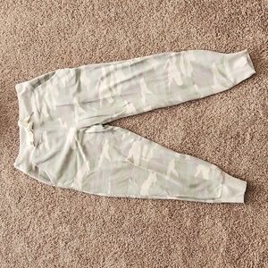 Aerie camo jogger sweatpants in colors light green and gray.